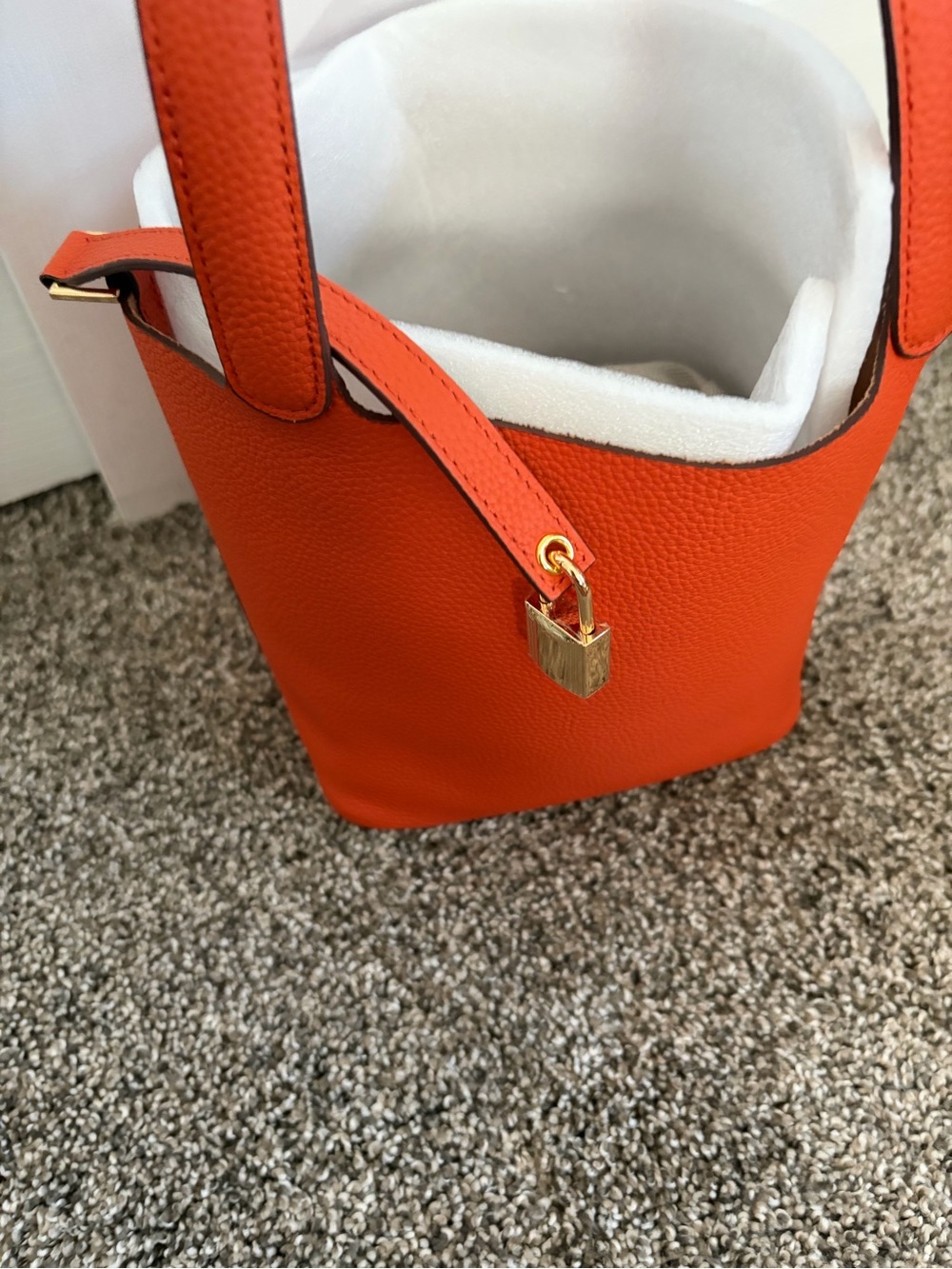 Textured Orange Leather Tote with Gold Padlock Accent